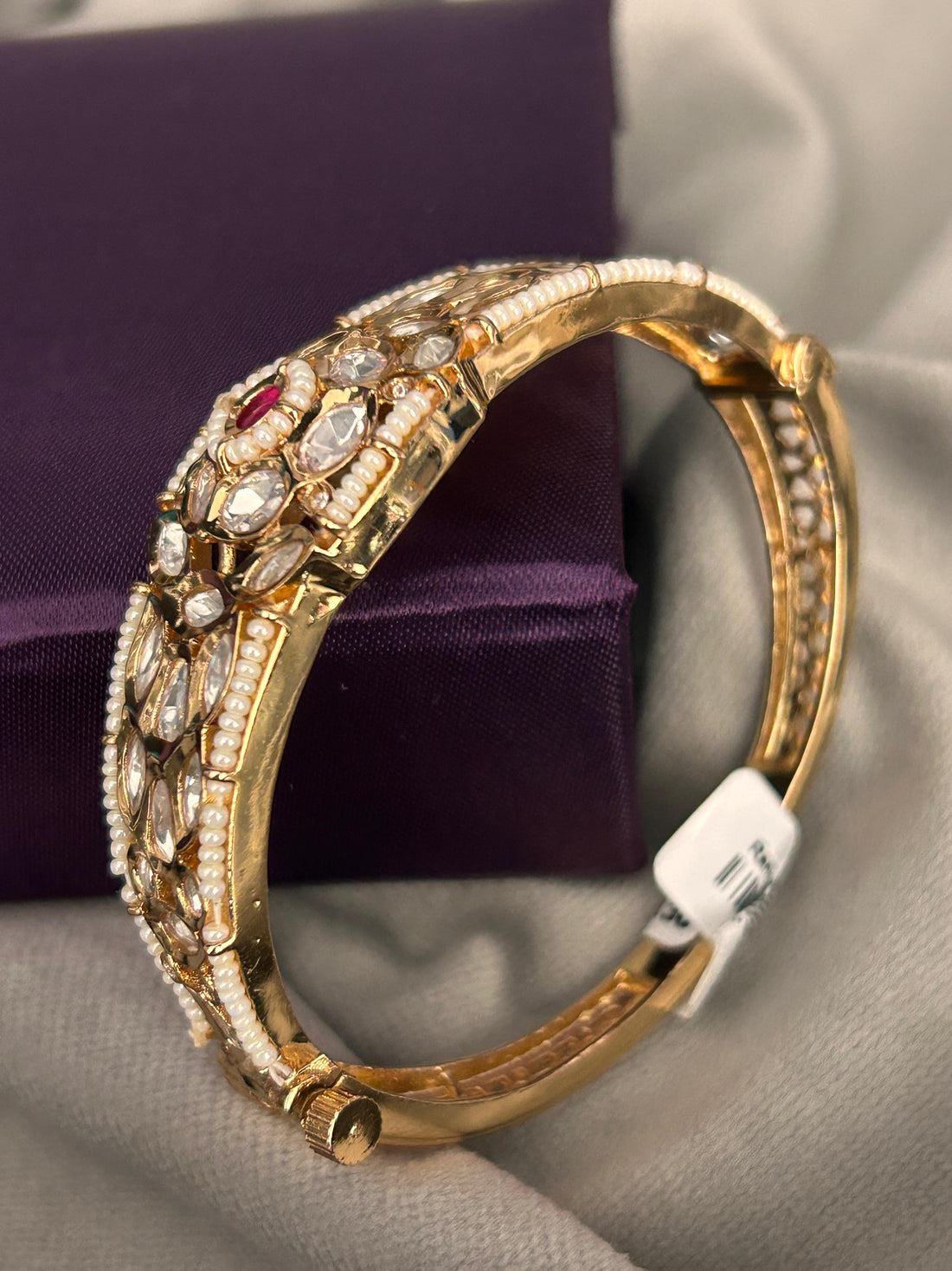 Pearl-Embellished Kundan Polki Bracelet with Ruby Centerpiece