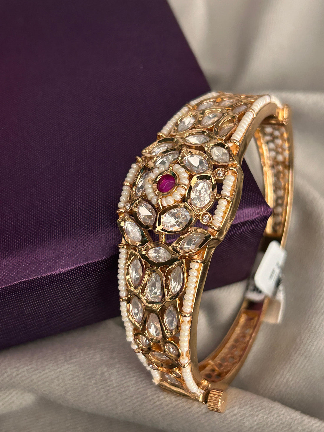 Pearl-Embellished Kundan Polki Bracelet with Ruby Centerpiece