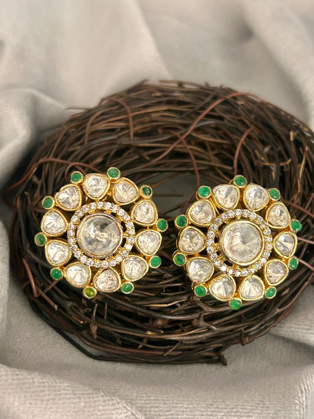 Round Kundan Stud Earrings with Green Accents