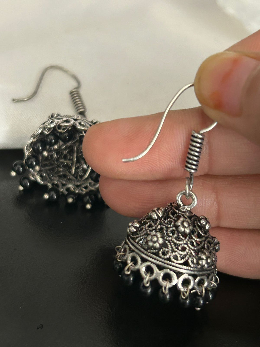 Oxidized Silver Floral Jhumka Earrings with Black Beads
