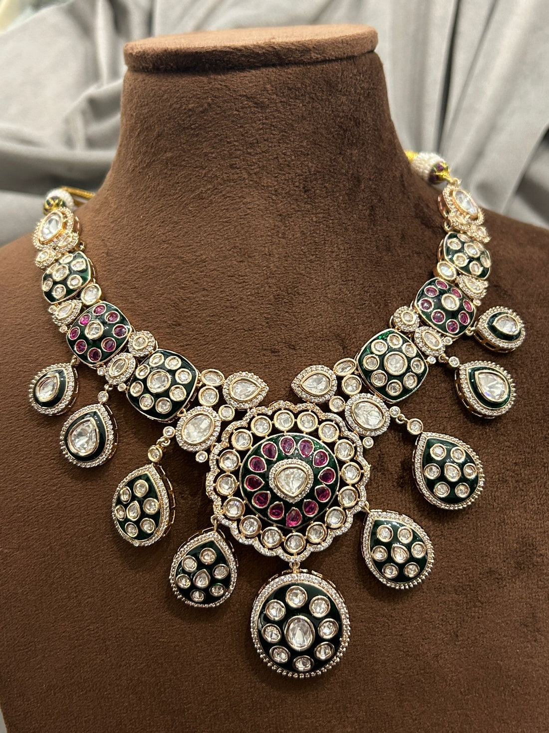 Grand Polki Kundan Bridal Set with Green & Ruby Accents