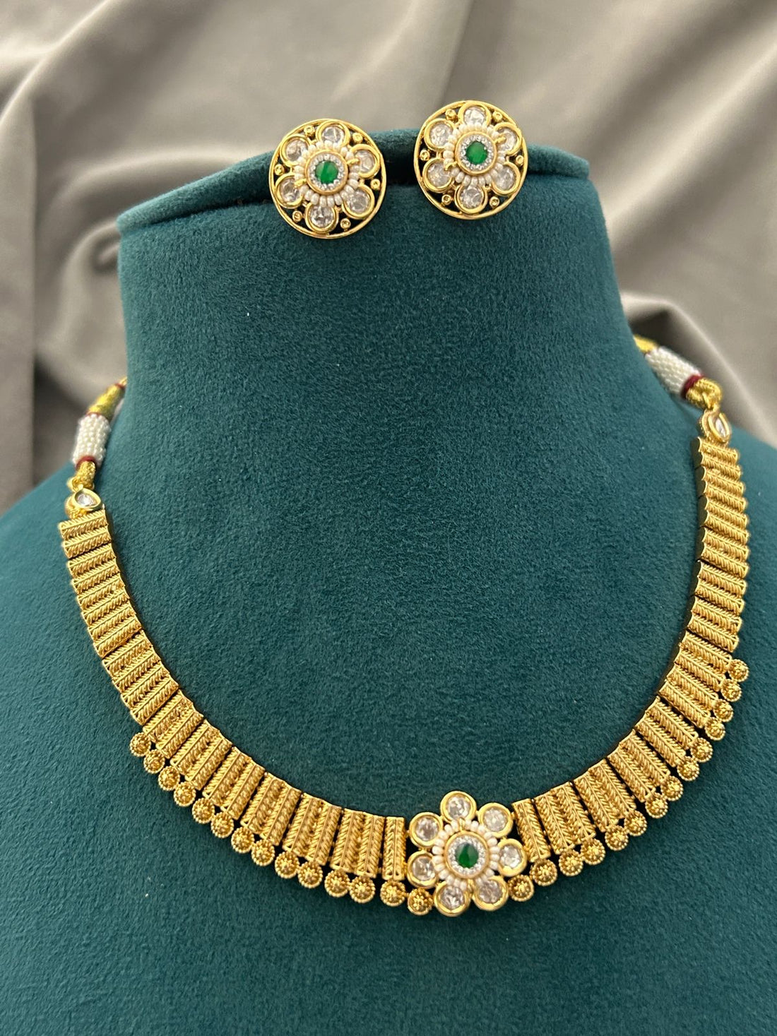 Antique Gold Floral Necklace Set – Emerald Stone Detailing with Matching Stud Earrings