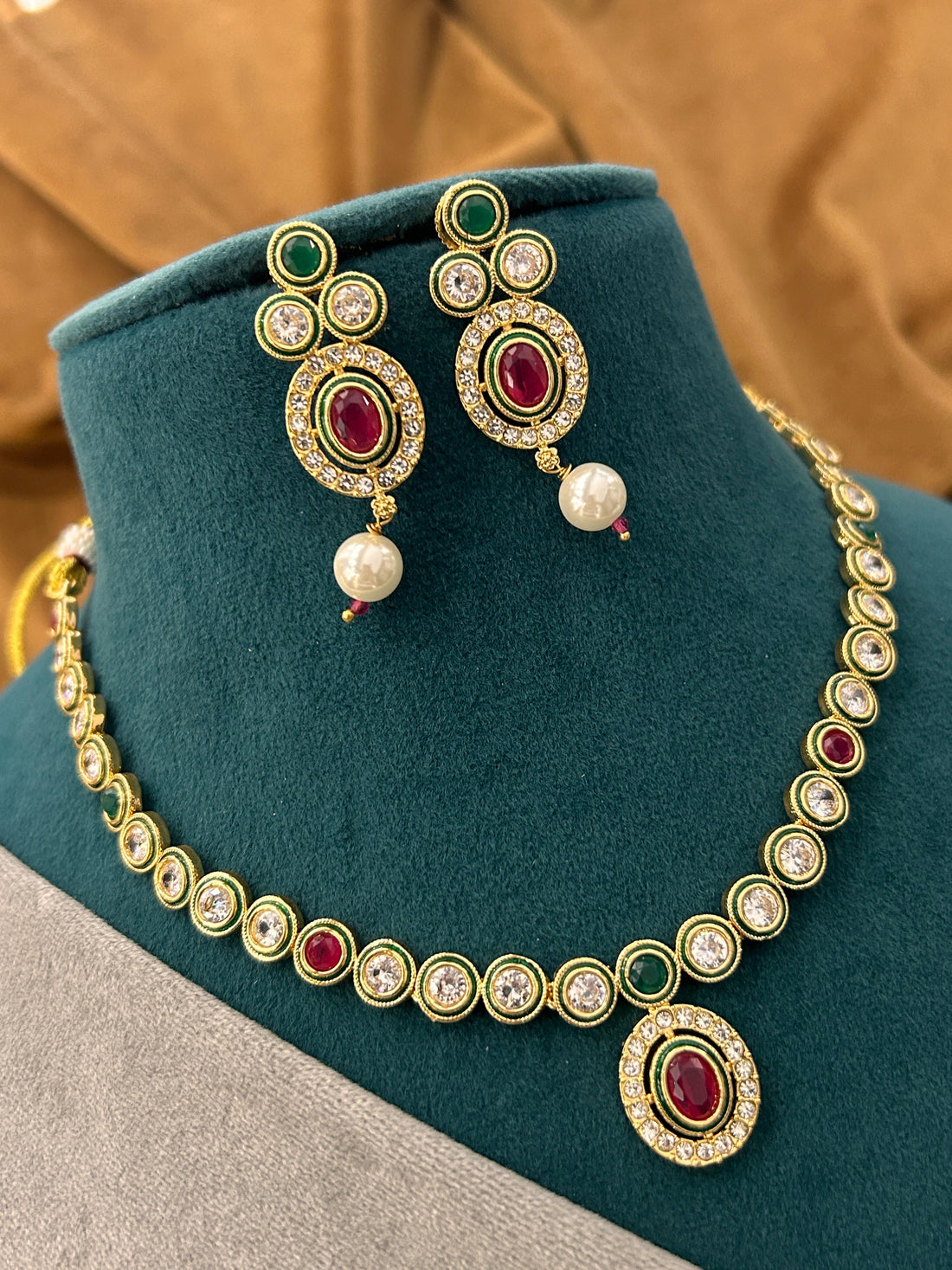 Ruby-Centered Diamond Necklace Set with Green Accents & Pearl Drops
