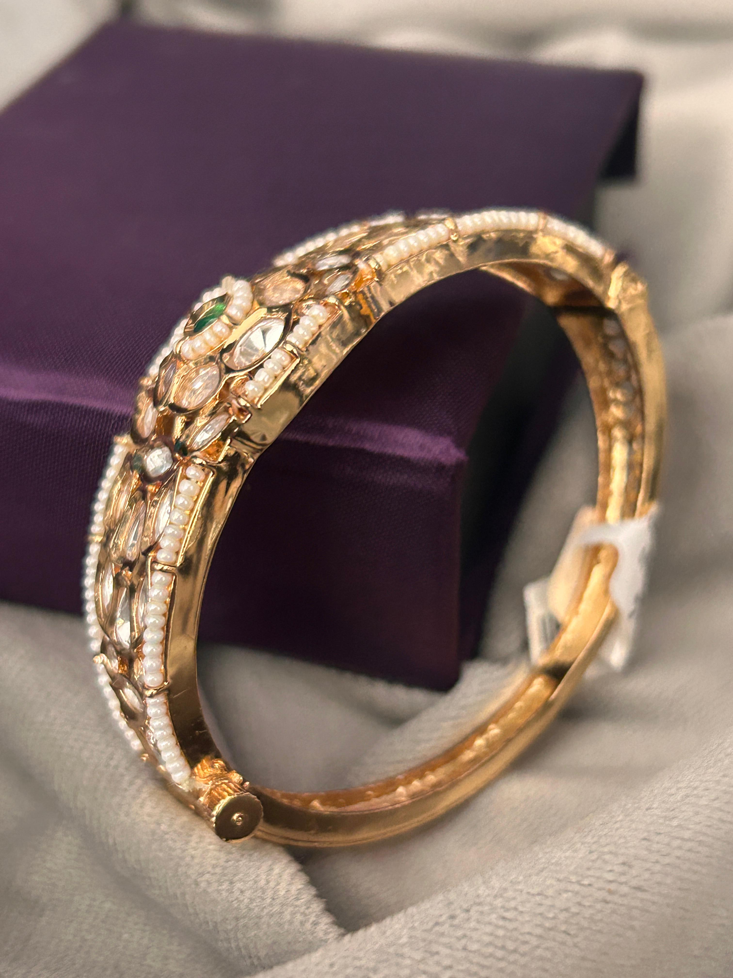 Royal Kundan Pearl Bangle with Emerald Centerpiece