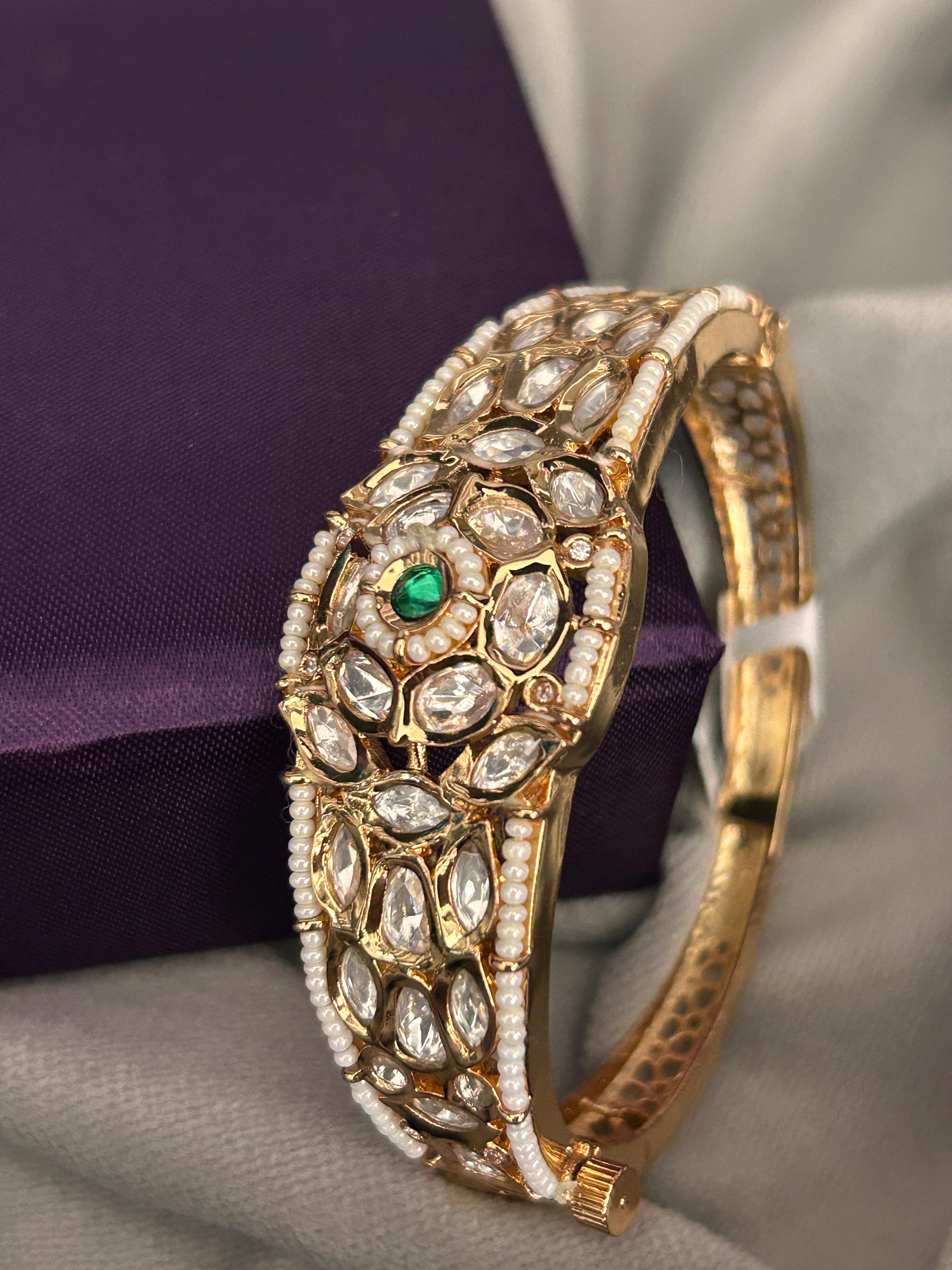 Royal Kundan Pearl Bangle with Emerald Centerpiece