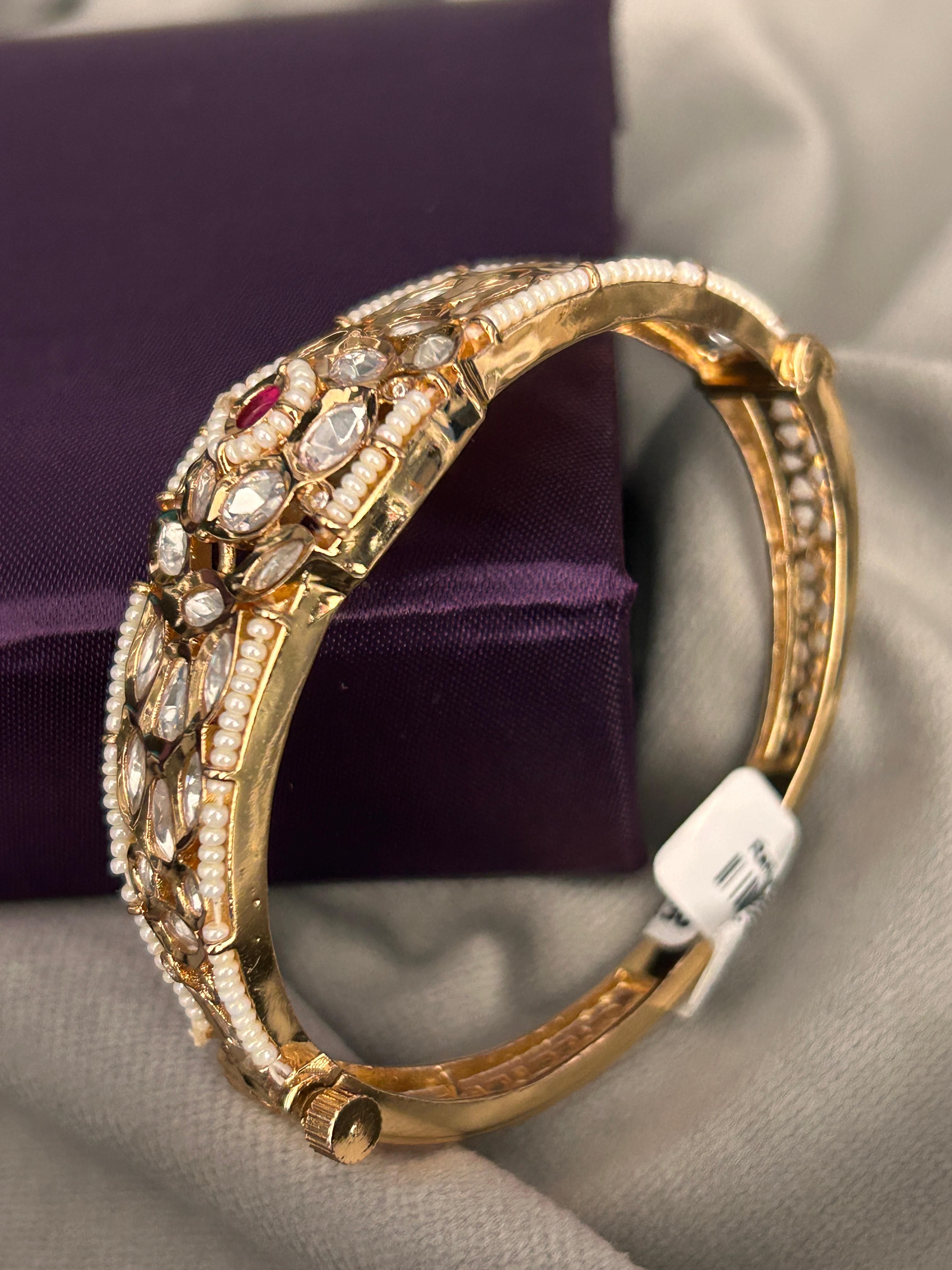 Pearl-Embellished Kundan Polki Bracelet with Ruby Centerpiece