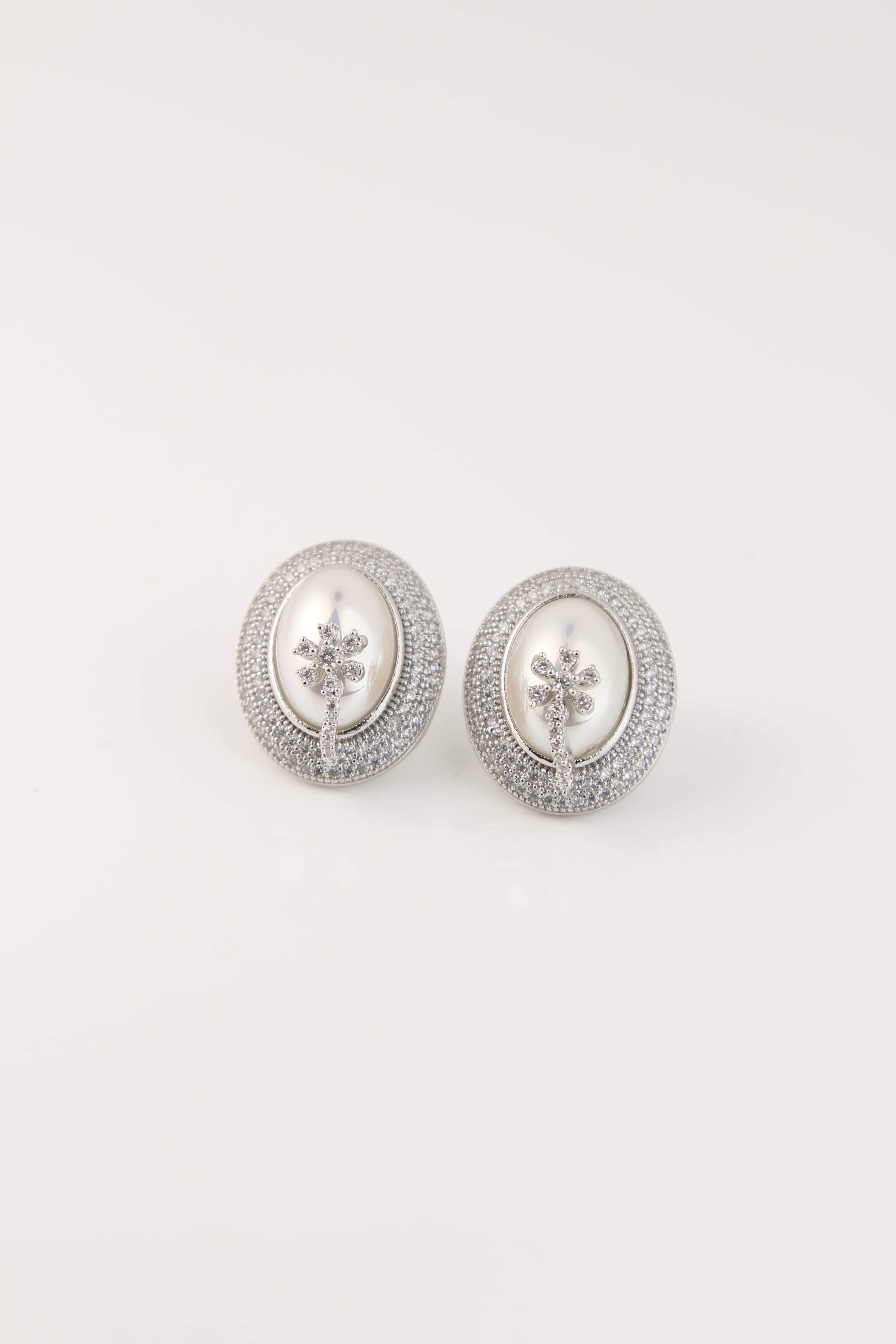 Elegant White Stone Stud Earrings with Floral Diamond Motif