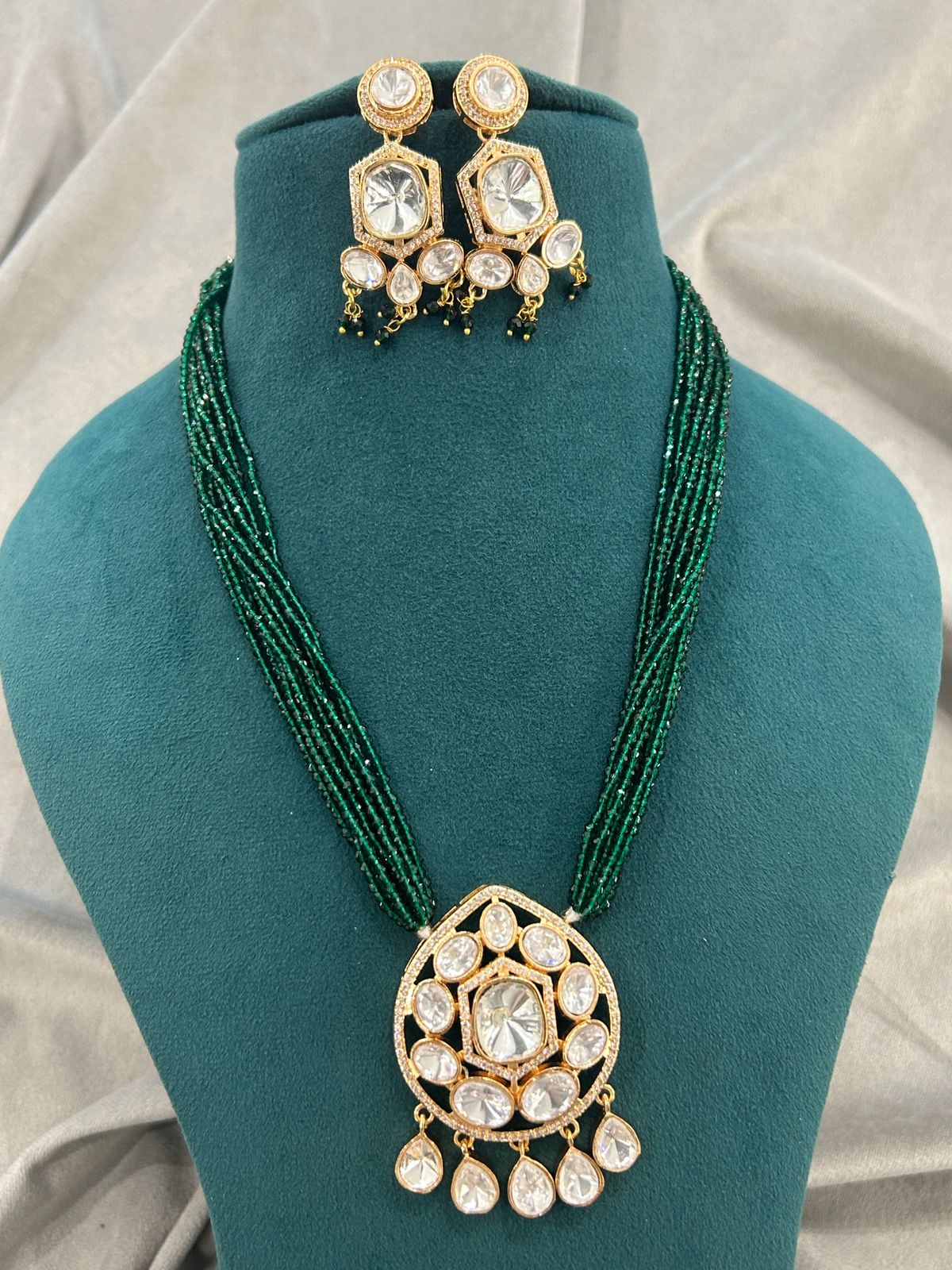 Emerald Strings Kundan Pendant Necklace Set