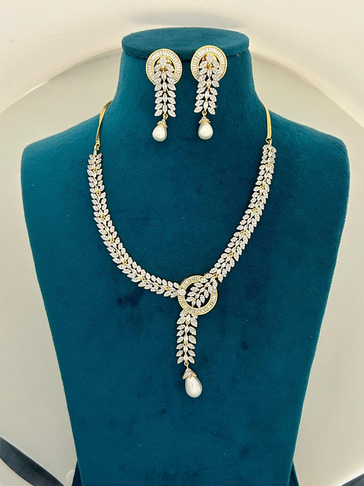Gold Finish CZ Diamond Leaf Necklace Set with Pearl Drop Luxury Party & Wedding Jewellery