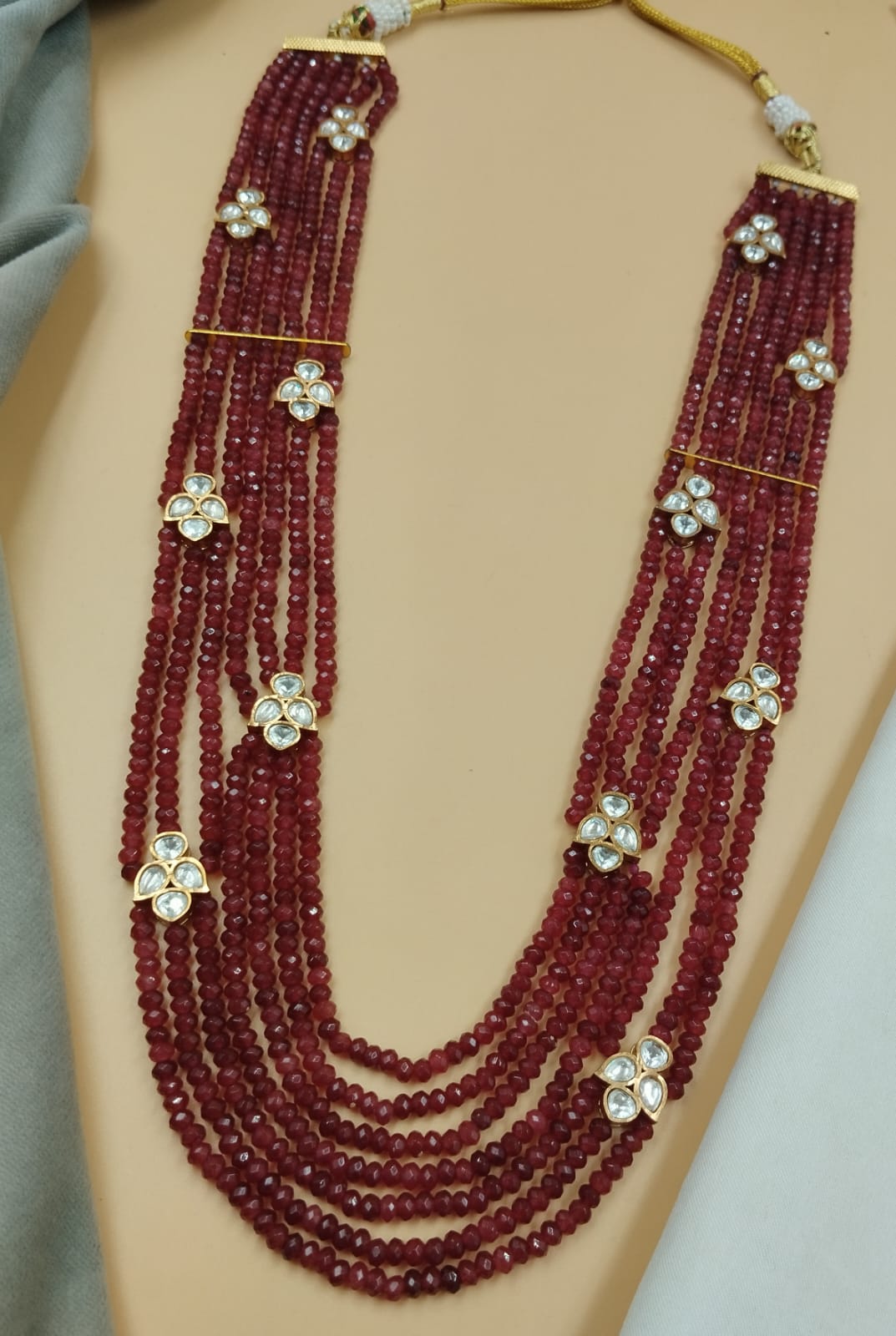 22-Inch Ruby Red Beads Multi-Layer Necklace with Kundan Floral Motifs