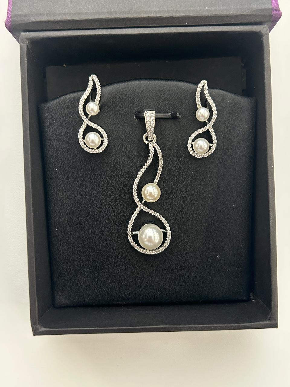 Elegant Pearl & CZ Pendant Set Silver Finish Twisted Infinity Design