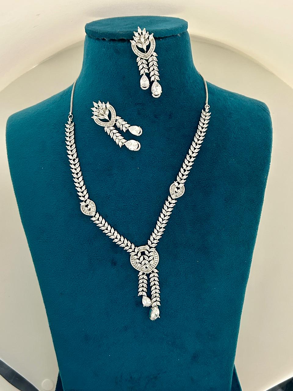 Silver Finish CZ Diamond Leaf Necklace Set with Designer Dangling Earrings Premium Party & Festive Jewellery