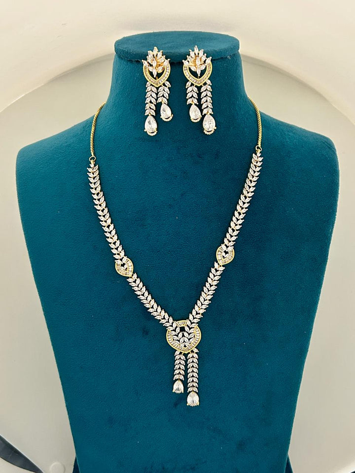 Gold Finish CZ Diamond Leaf Motif Necklace Set with Dangling Earrings Premium Party & Festive Jewellery